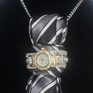 Elegant Black and Silver Striped Tie with Chain Accent